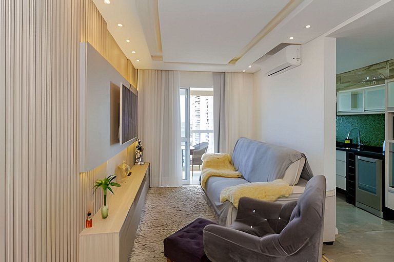 Apartamento com três quartos e ar-condicionado