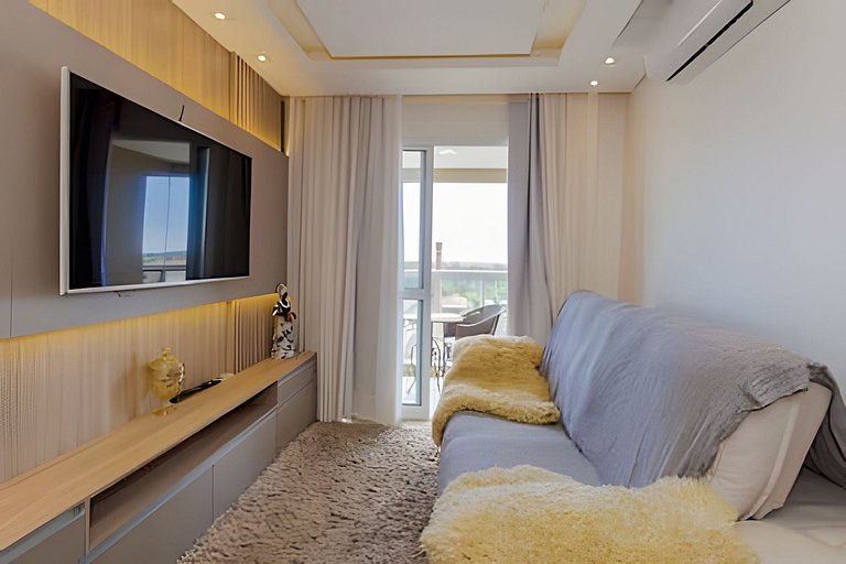 Apartamento com três quartos e ar-condicionado