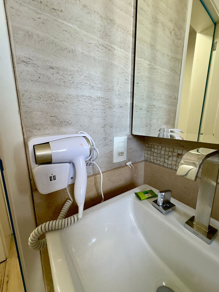 Apartamento com três quartos e ar-condicionado